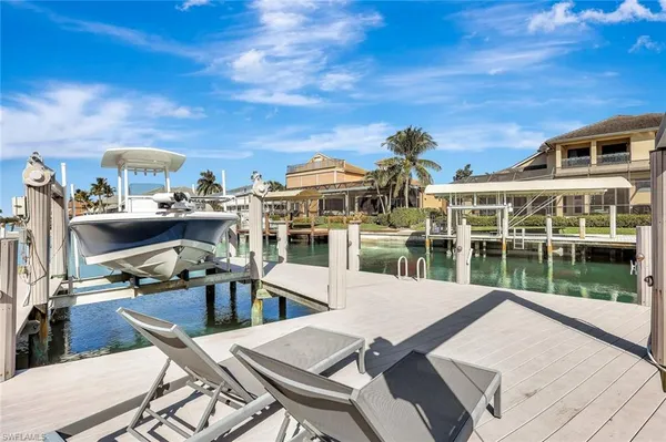 a view of a swimming pool with an ocean view