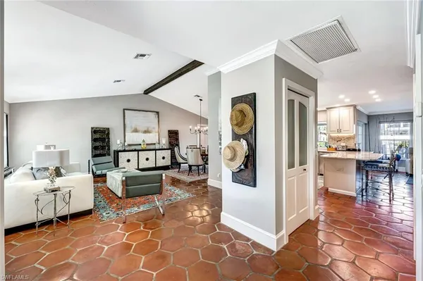 a living room with furniture and a table