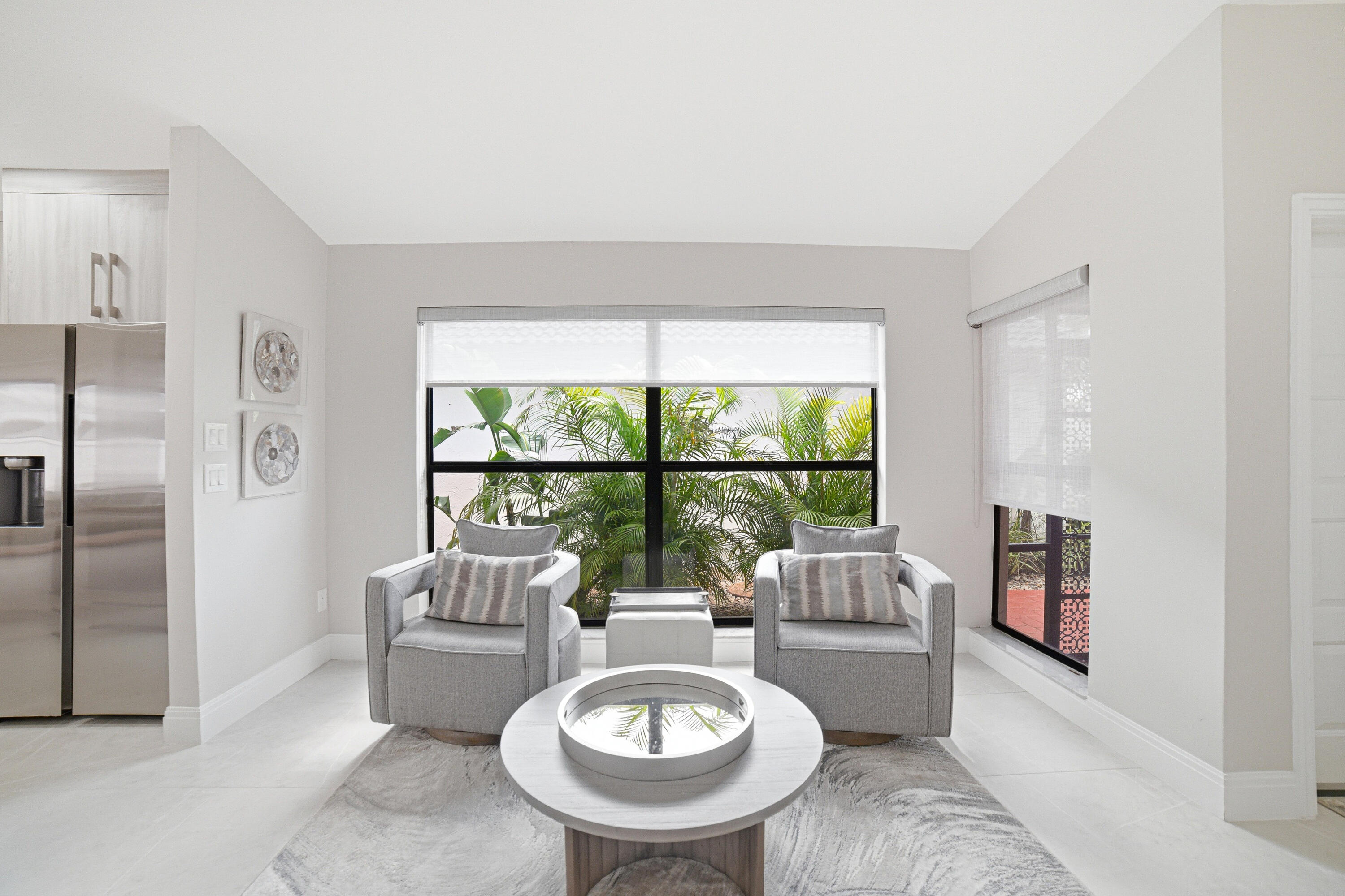 10861 White Aspen Lane Boca Raton, FL 33428 - Photo 12 of 70 a living room with furniture and a large window