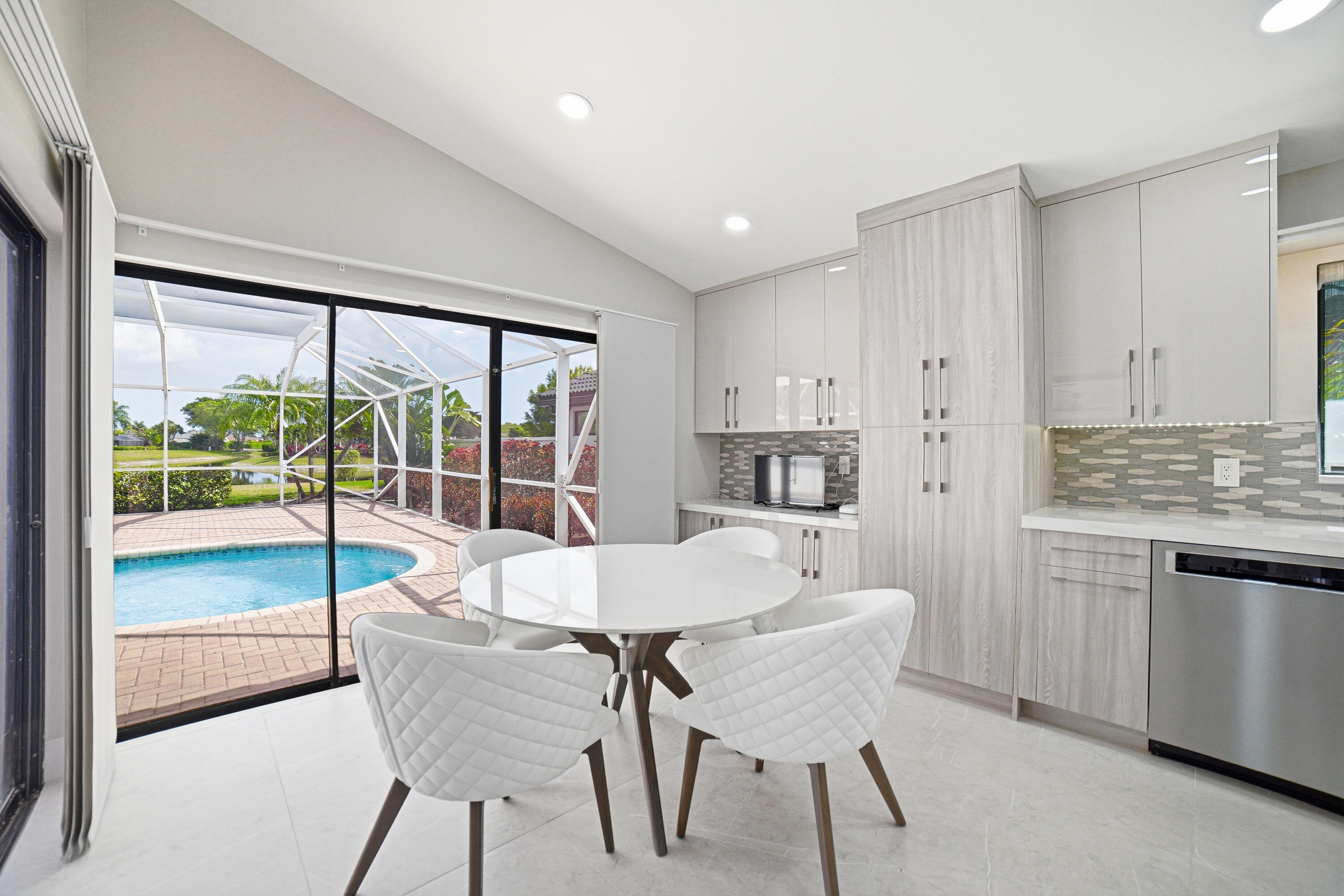 10861 White Aspen Lane Boca Raton, FL 33428 - Photo 19 of 70 a view of a dining room with furniture window and outside view