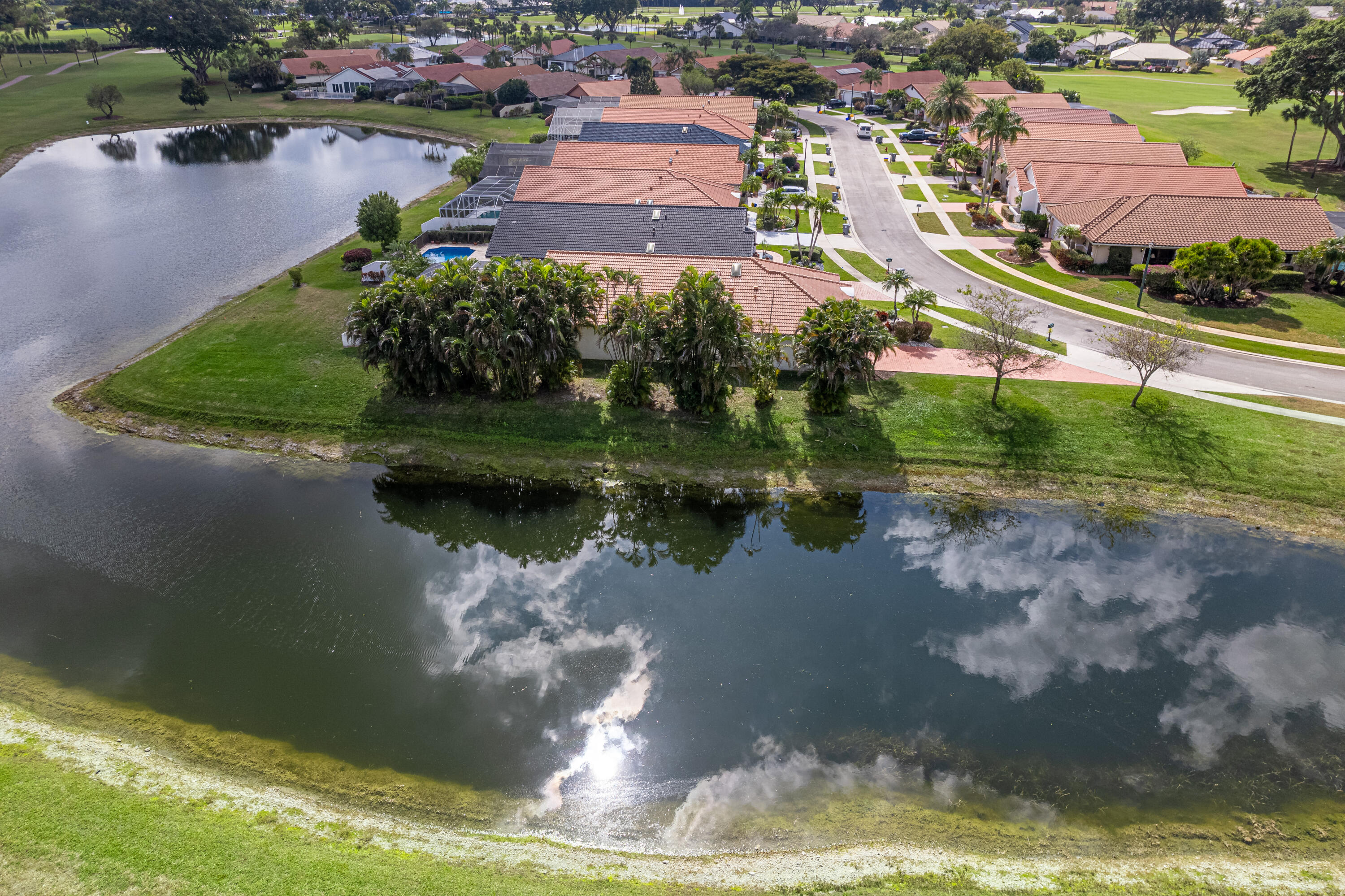 10861 White Aspen Lane Boca Raton, FL 33428 - Photo 31 of 70 a view of a lake with a houses