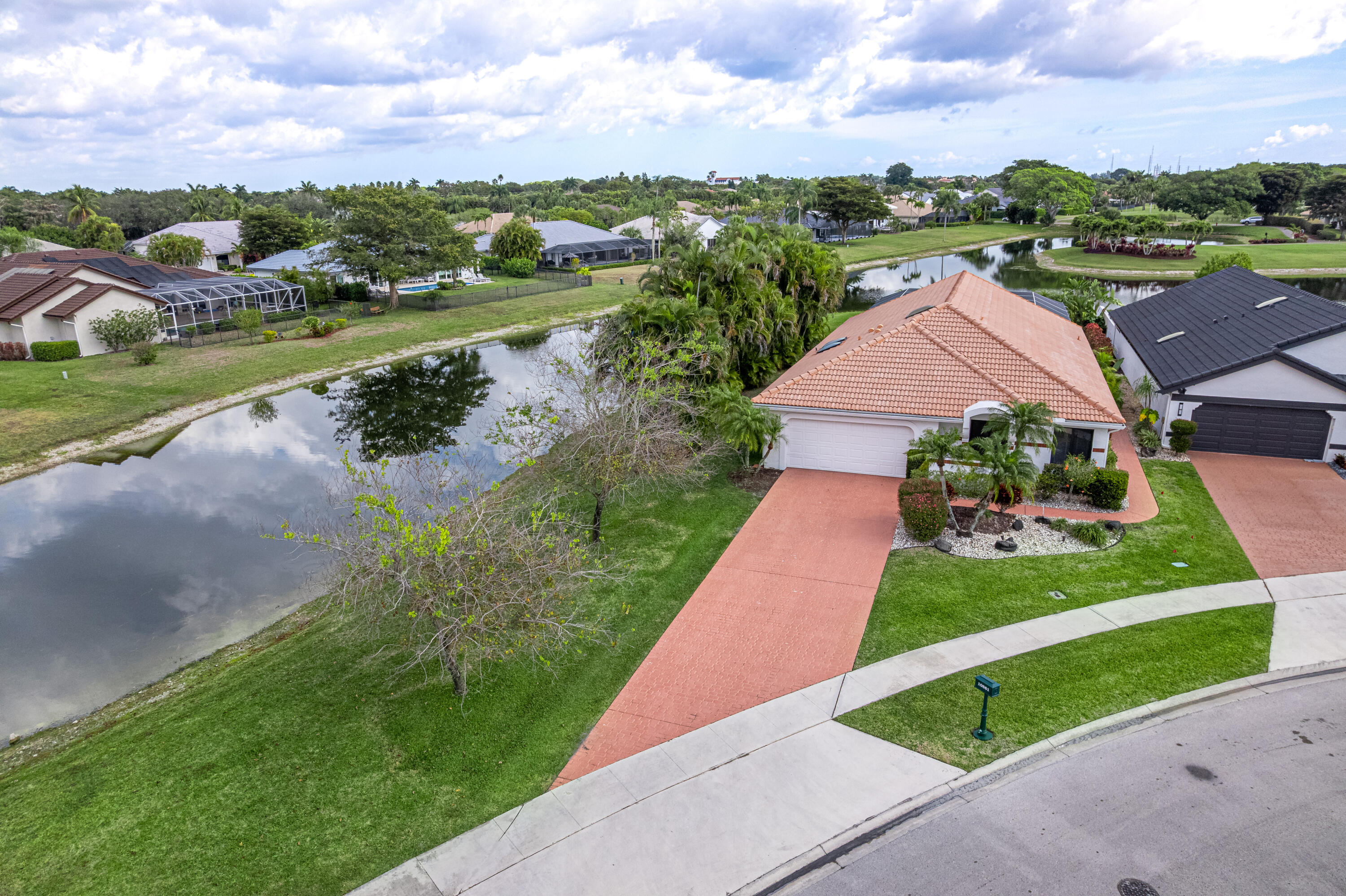 10861 White Aspen Lane Boca Raton, FL 33428 - Photo 33 of 70 an aerial view of a house with a garden and trees