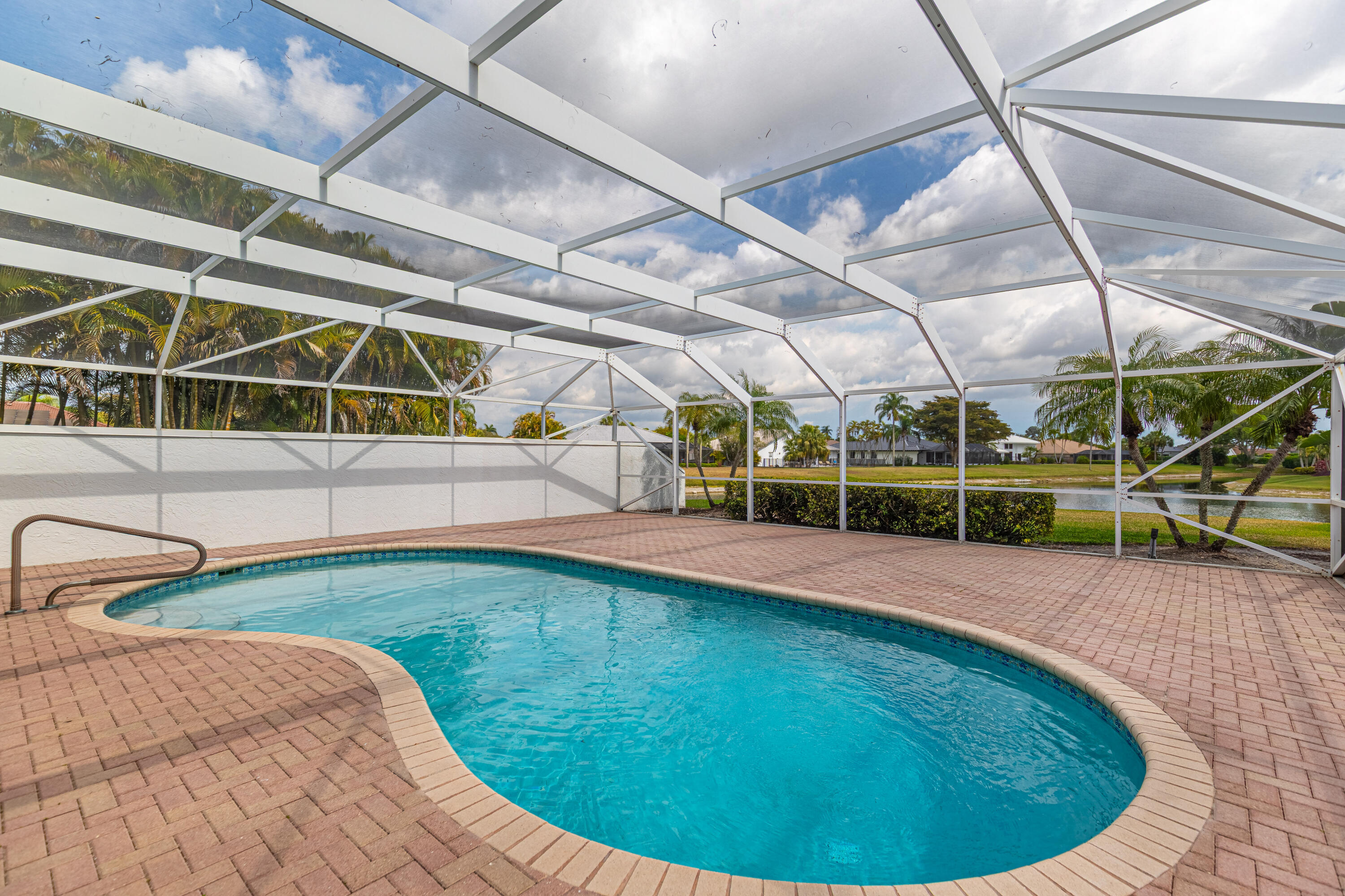10861 White Aspen Lane Boca Raton, FL 33428 - Photo 40 of 70 a view of a swimming pool with a patio