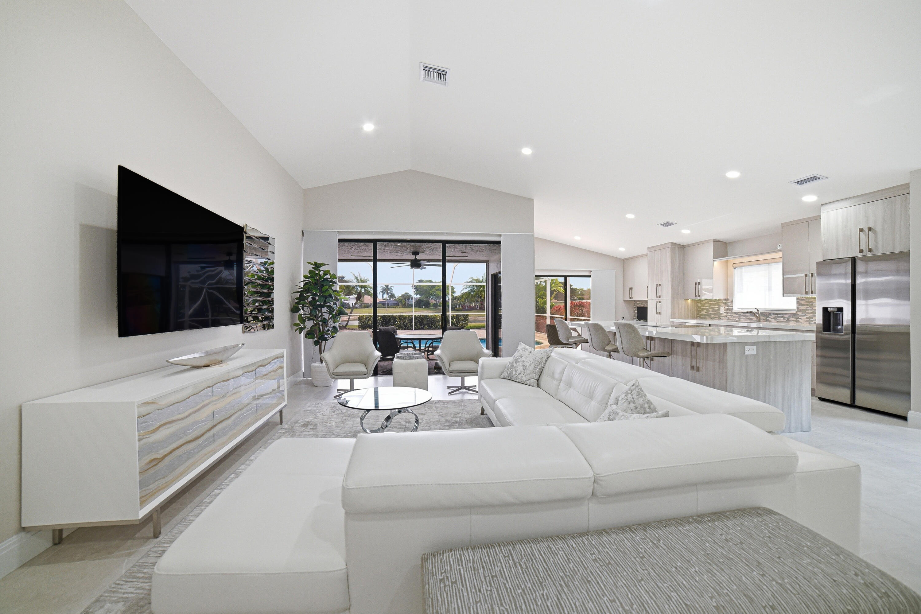 10861 White Aspen Lane Boca Raton, FL 33428 - Photo 4 of 70 a living room with furniture and a flat screen tv