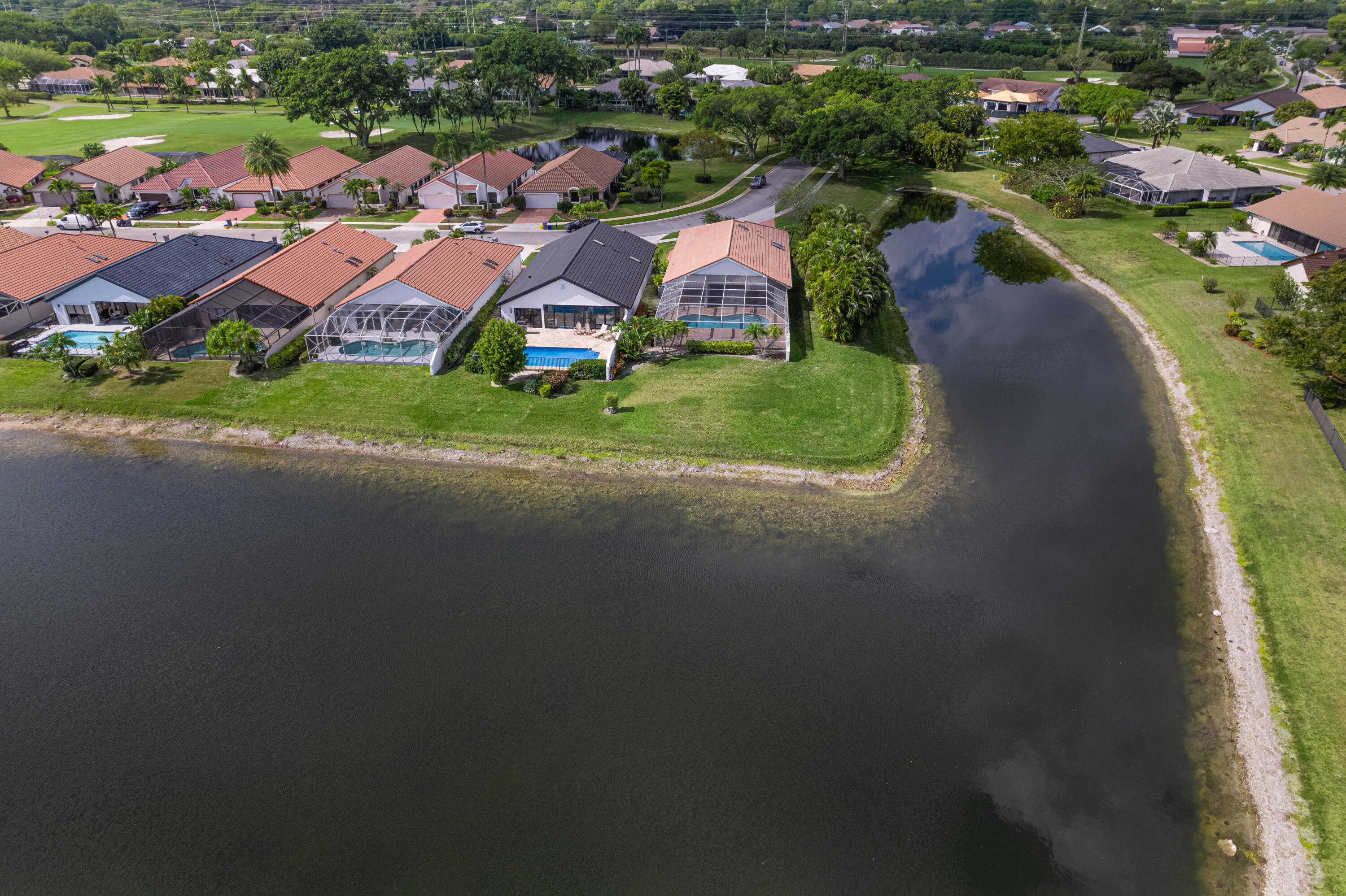 10861 White Aspen Lane Boca Raton, FL 33428 - Photo 41 of 70 an aerial view of residential houses with outdoor space and street view