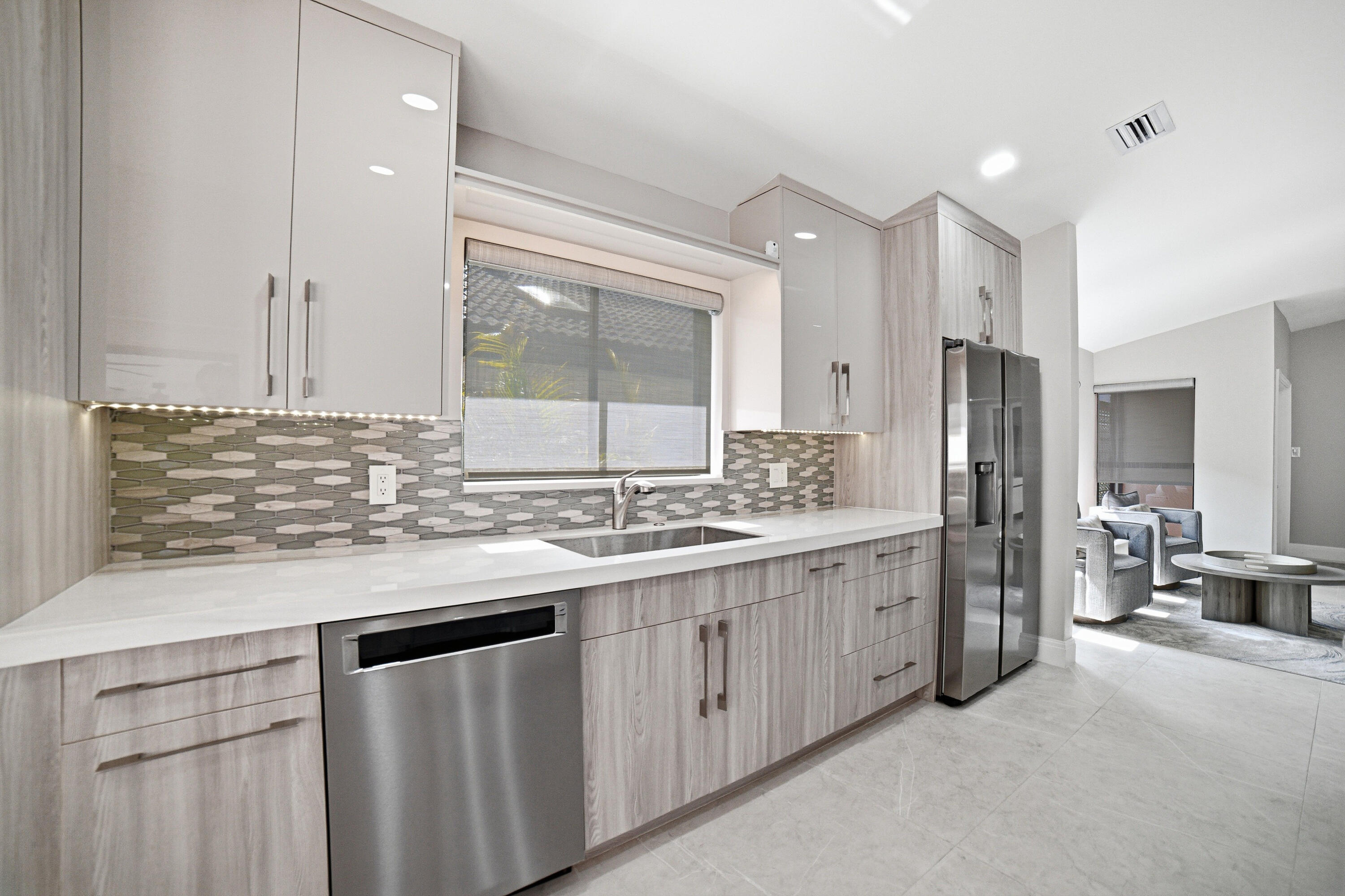 10861 White Aspen Lane Boca Raton, FL 33428 - Photo 5 of 70 a bathroom with a granite countertop sink two mirror and a