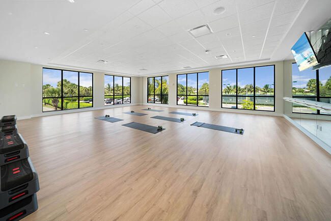 10861 White Aspen Lane Boca Raton, FL 33428 - Photo 65 of 70 a view of an empty room with a window and wooden floor