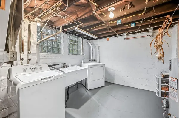 a utility room with dryer and washer