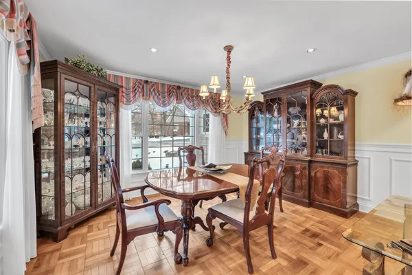 a view of a dining room with furniture window and outside view