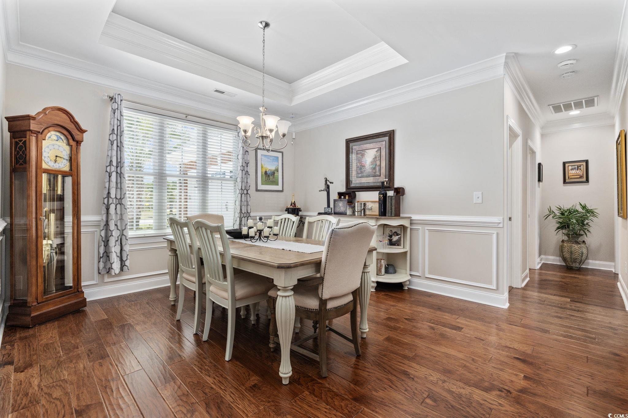 310 Babylon Pine Drive Myrtle Beach, SC 29579 - Photo 11 of 39 Dining room featuring a chandelier, dark wood-type