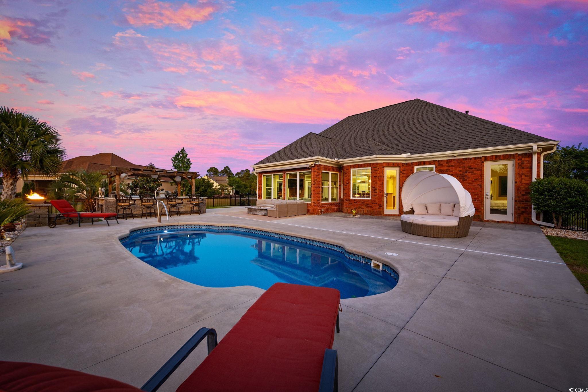 310 Babylon Pine Drive Myrtle Beach, SC 29579 - Photo 31 of 39 View of swimming pool featuring outdoor lounge are