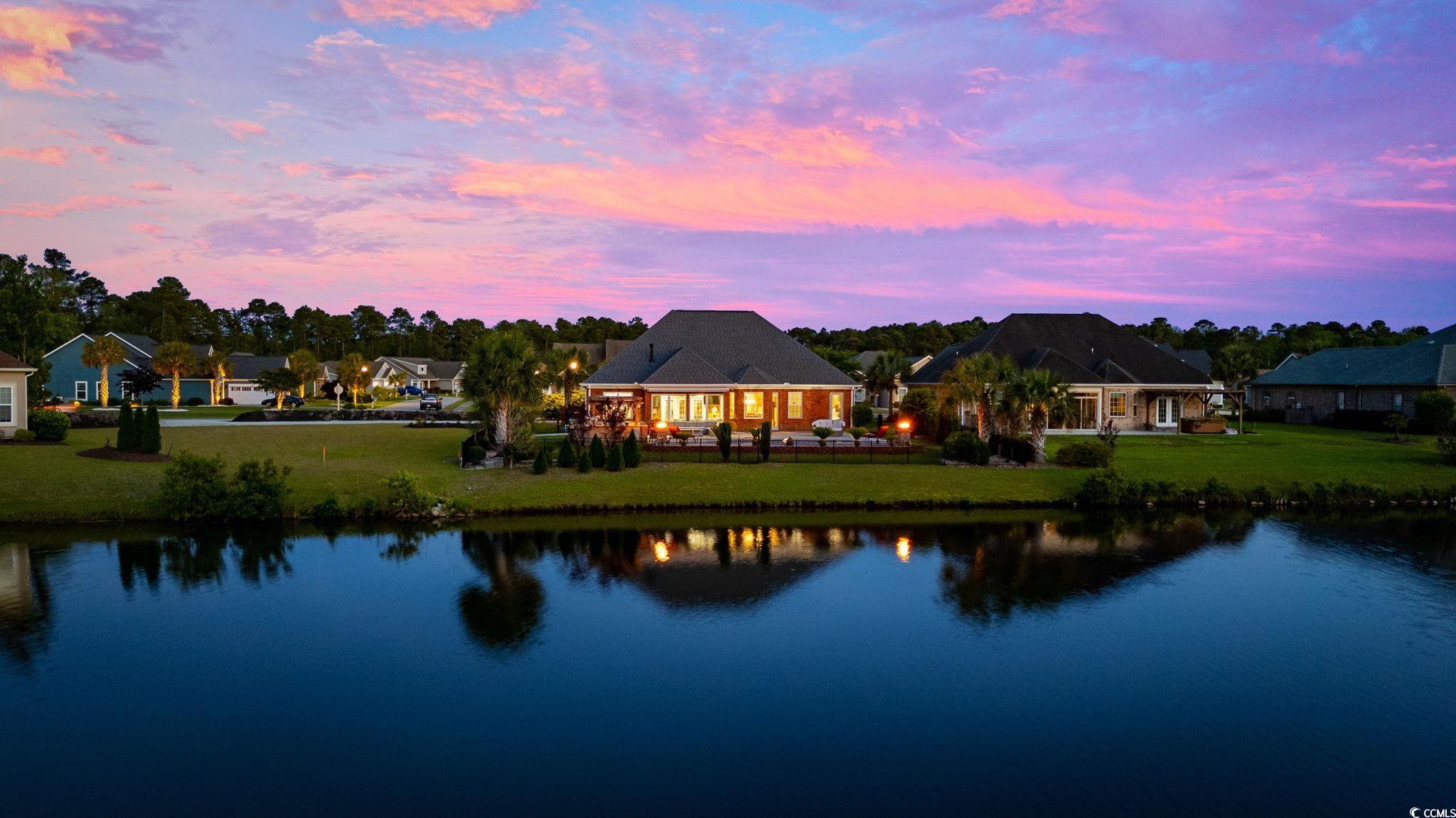 310 Babylon Pine Drive Myrtle Beach, SC 29579 - Photo 36 of 39 View of green lawn featuring a pergola, a patio ar