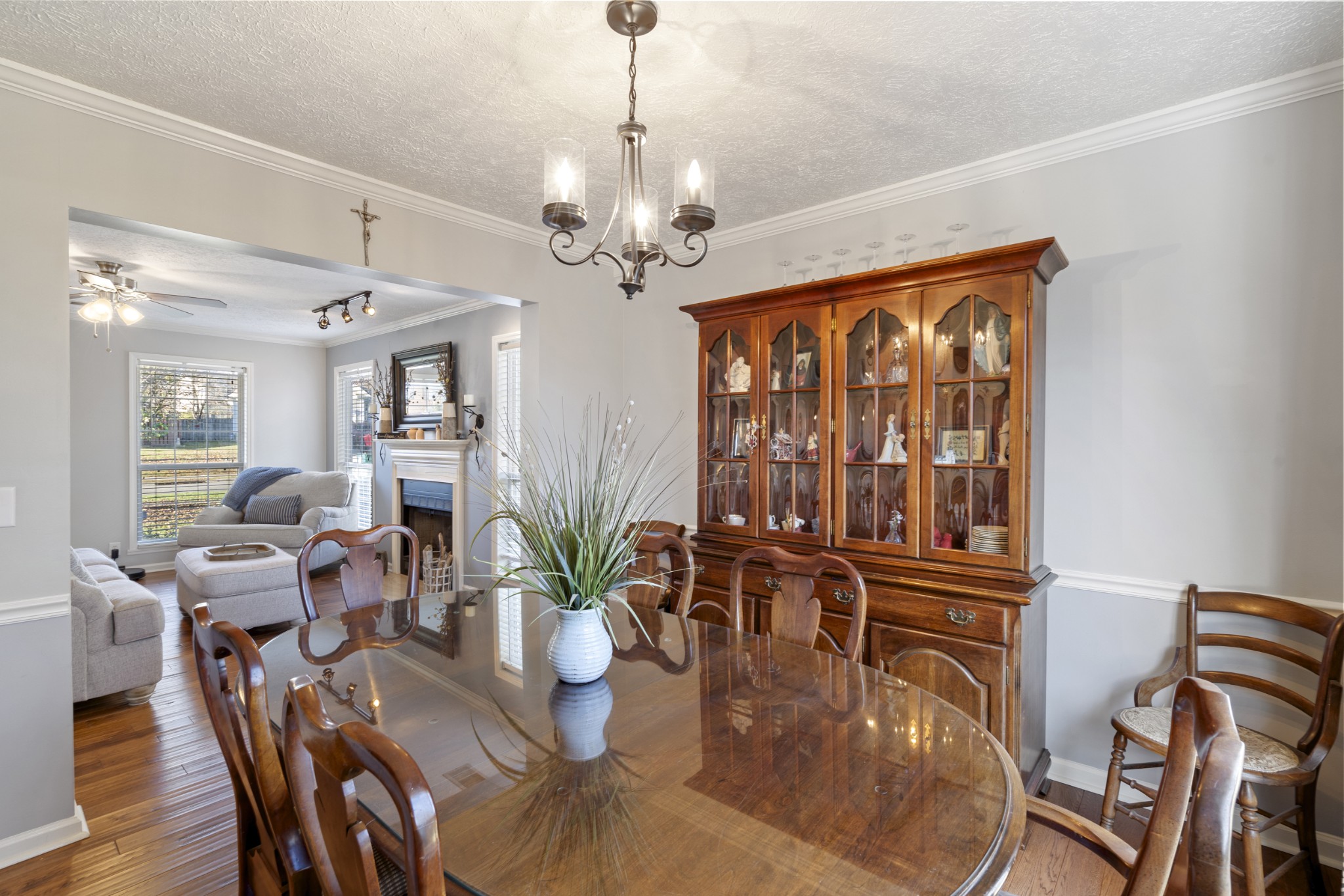 131 Deer Ridge Lane Hendersonville, TN 37075 - Photo 17 of 44 a dining room with furniture a chandelier and wooden floor
