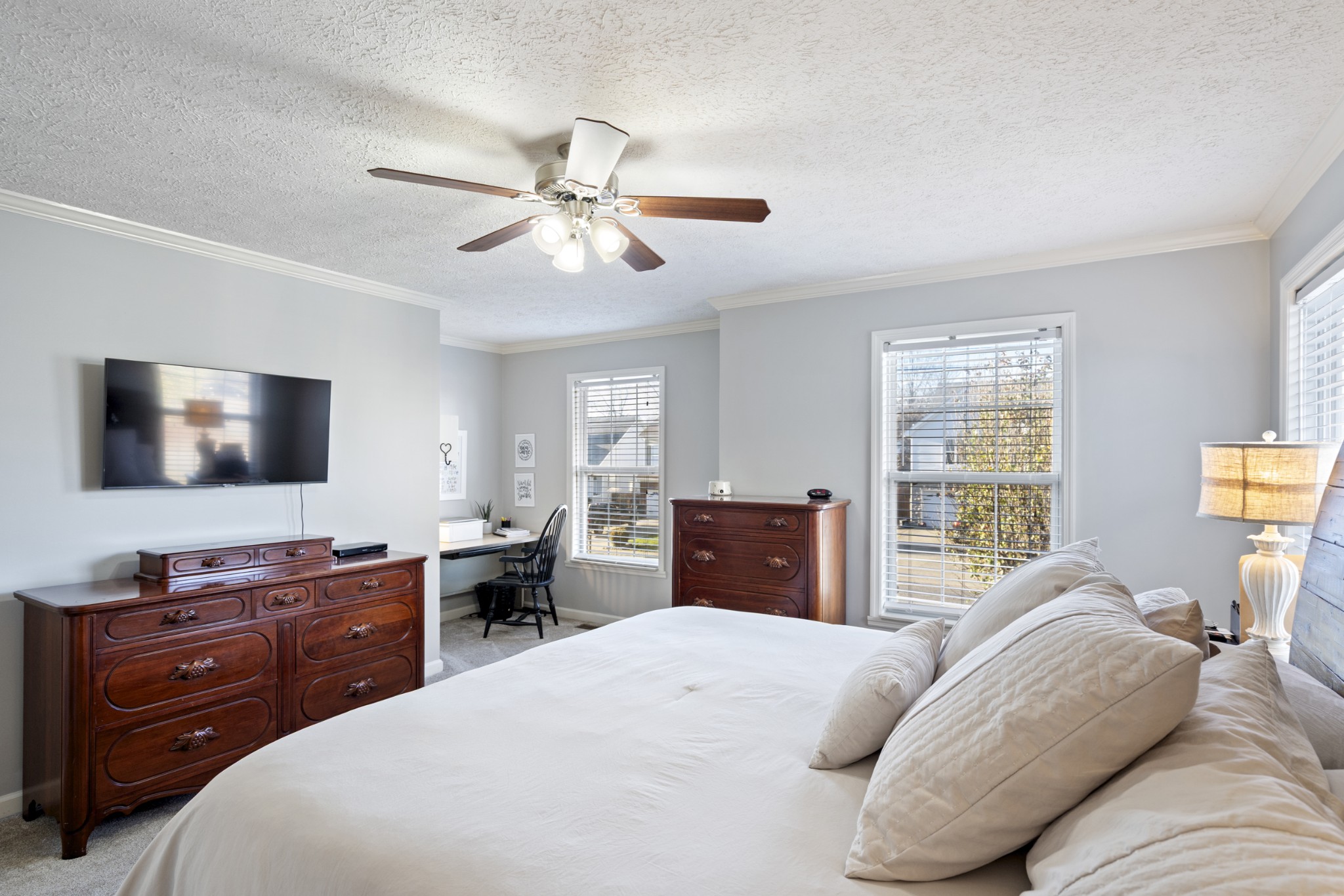131 Deer Ridge Lane Hendersonville, TN 37075 - Photo 22 of 44 a bedroom with a bed and a flat screen tv