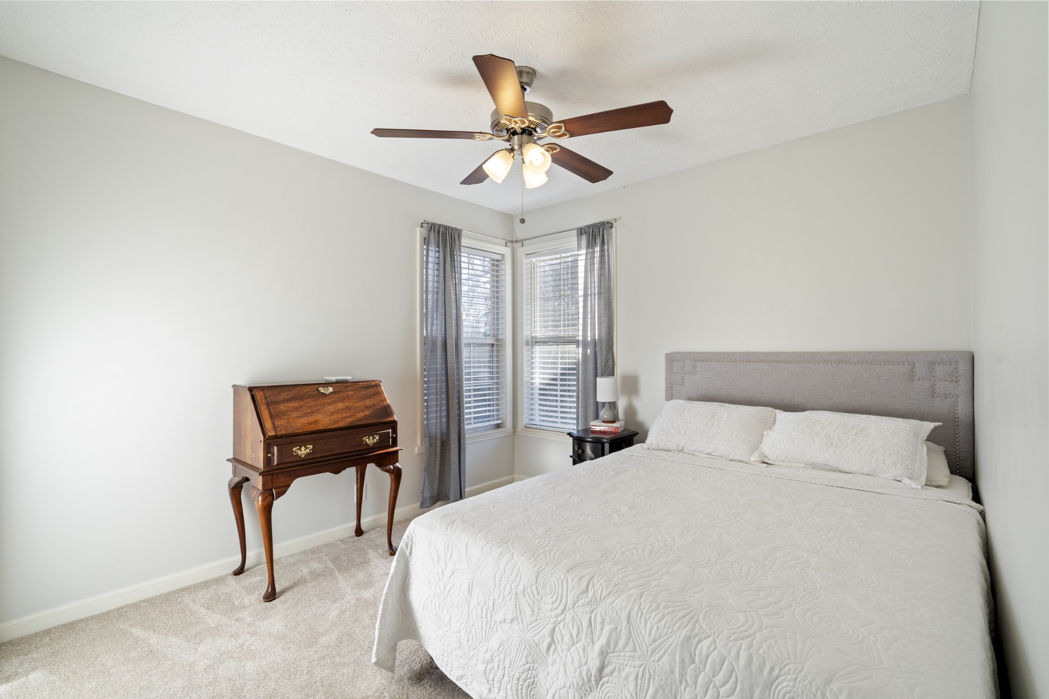 131 Deer Ridge Lane Hendersonville, TN 37075 - Photo 29 of 44 a bedroom with a bed and a piano