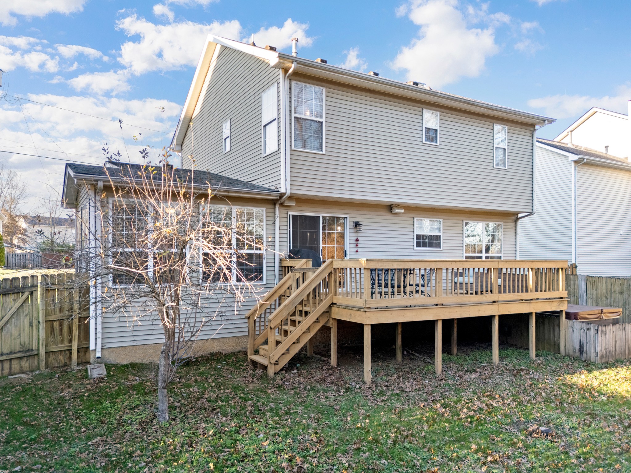 131 Deer Ridge Lane Hendersonville, TN 37075 - Photo 35 of 44 a view of a house with a yard and deck