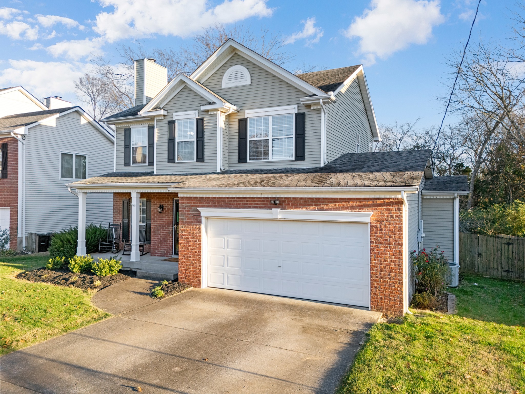 131 Deer Ridge Lane Hendersonville, TN 37075 - Photo 4 of 44 a front view of a house with garden