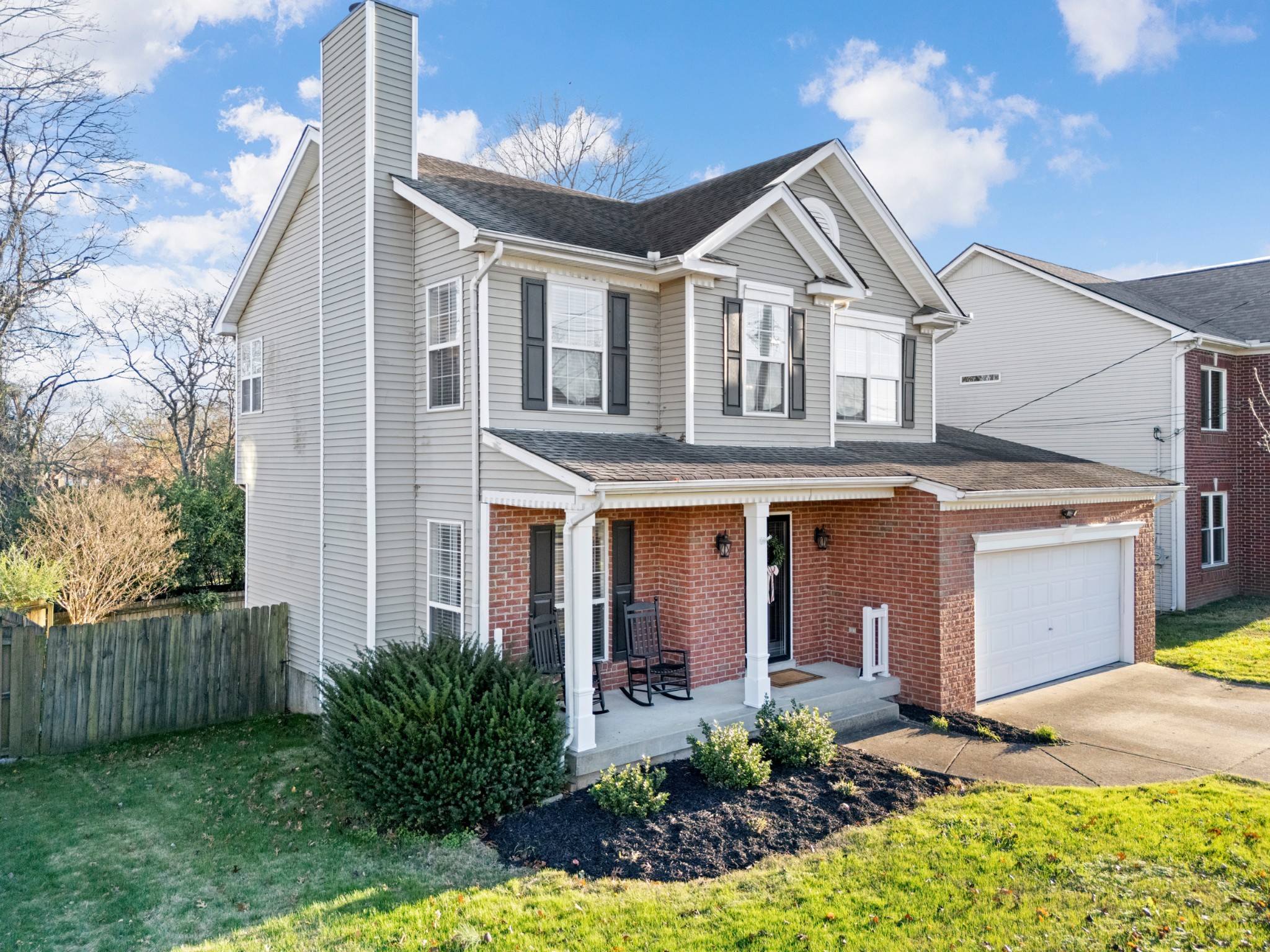 131 Deer Ridge Lane Hendersonville, TN 37075 - Photo 5 of 44 a view of a white house next to a yard
