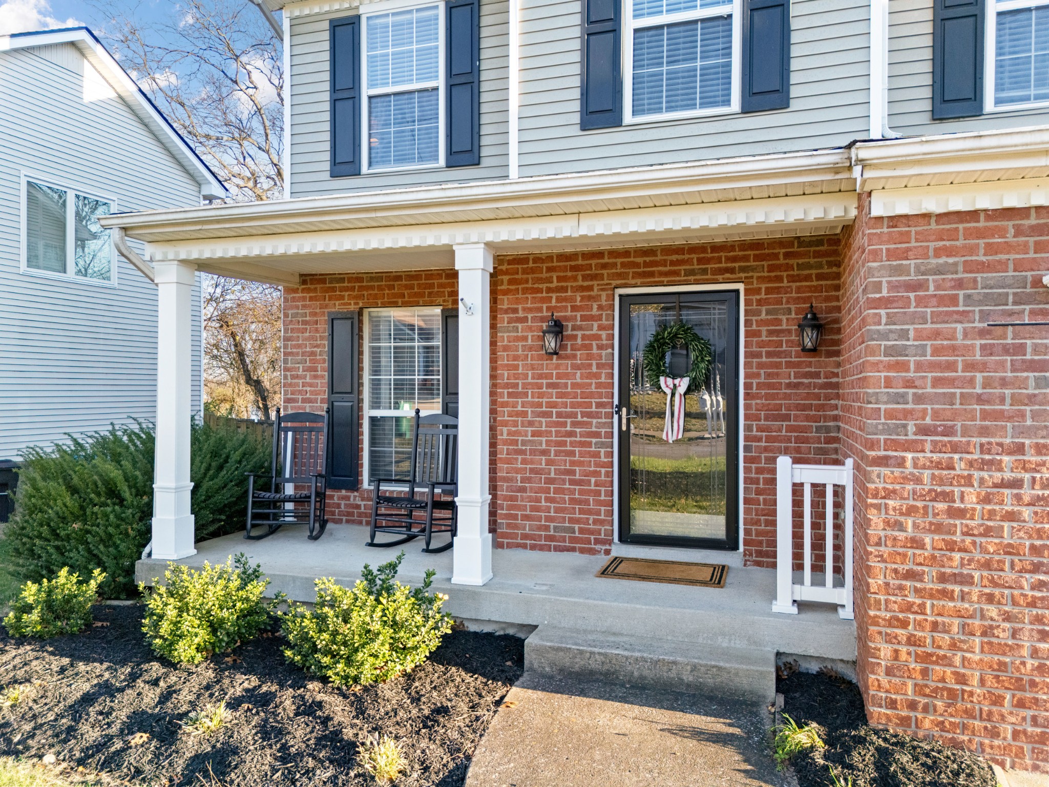 131 Deer Ridge Lane Hendersonville, TN 37075 - Photo 6 of 44 front view of a brick house with a large window