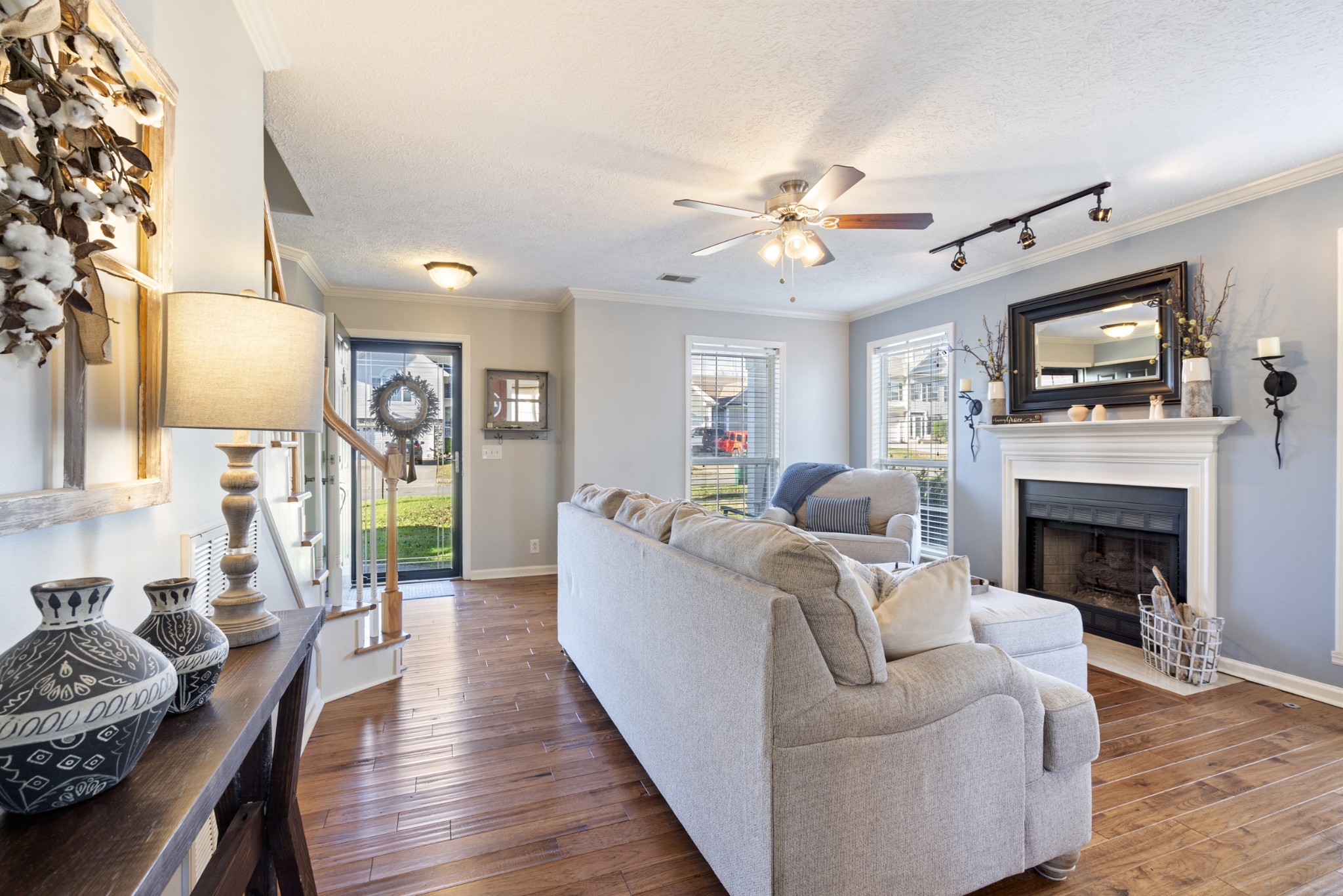 131 Deer Ridge Lane Hendersonville, TN 37075 - Photo 10 of 44 a living room with furniture a fireplace and a flat screen tv