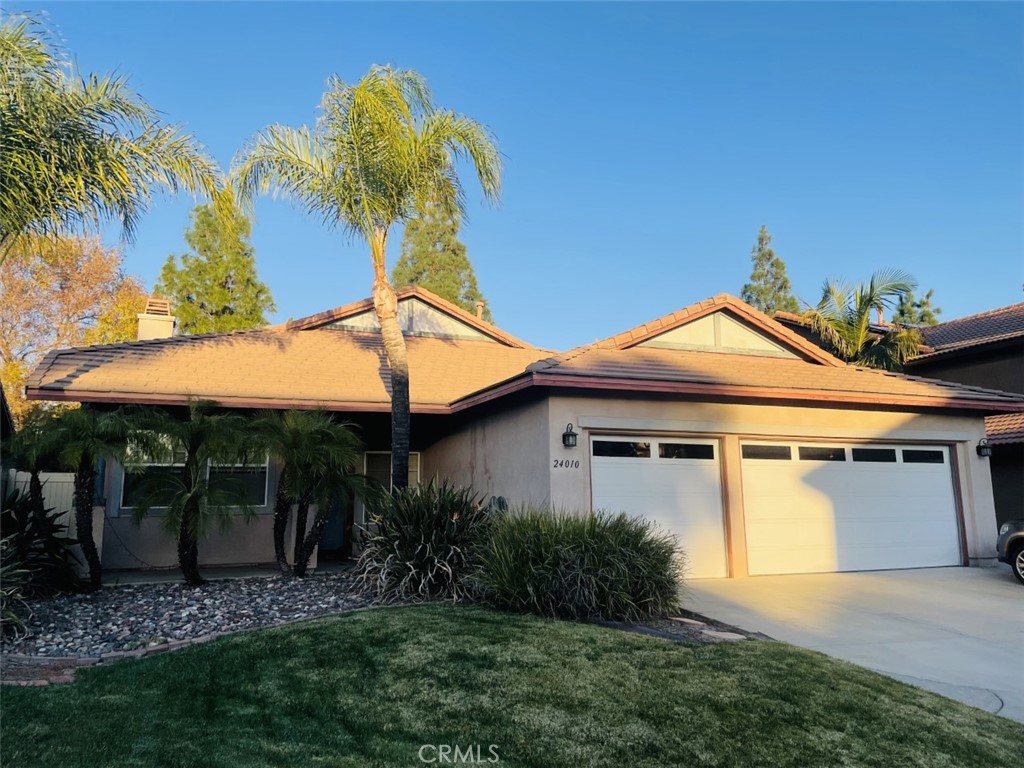 24010 Ristras Lane Murrieta, CA 92562 - Photo 1 of 1 a view of a house with roof and a yard