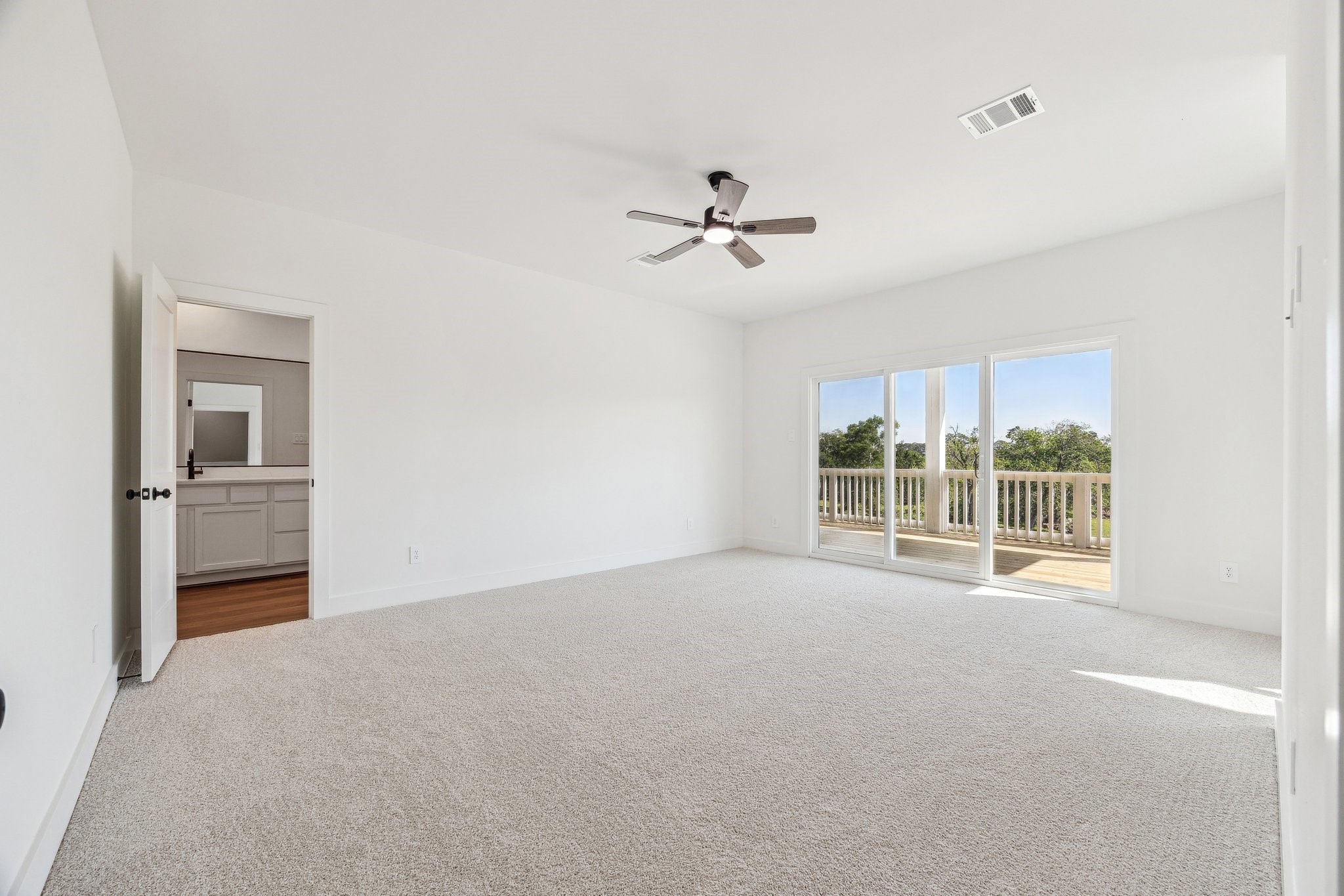 3845 Water Street Dickinson, TX 77539 - Photo 15 of 38 Welcome to the bright and airy primary retreat.