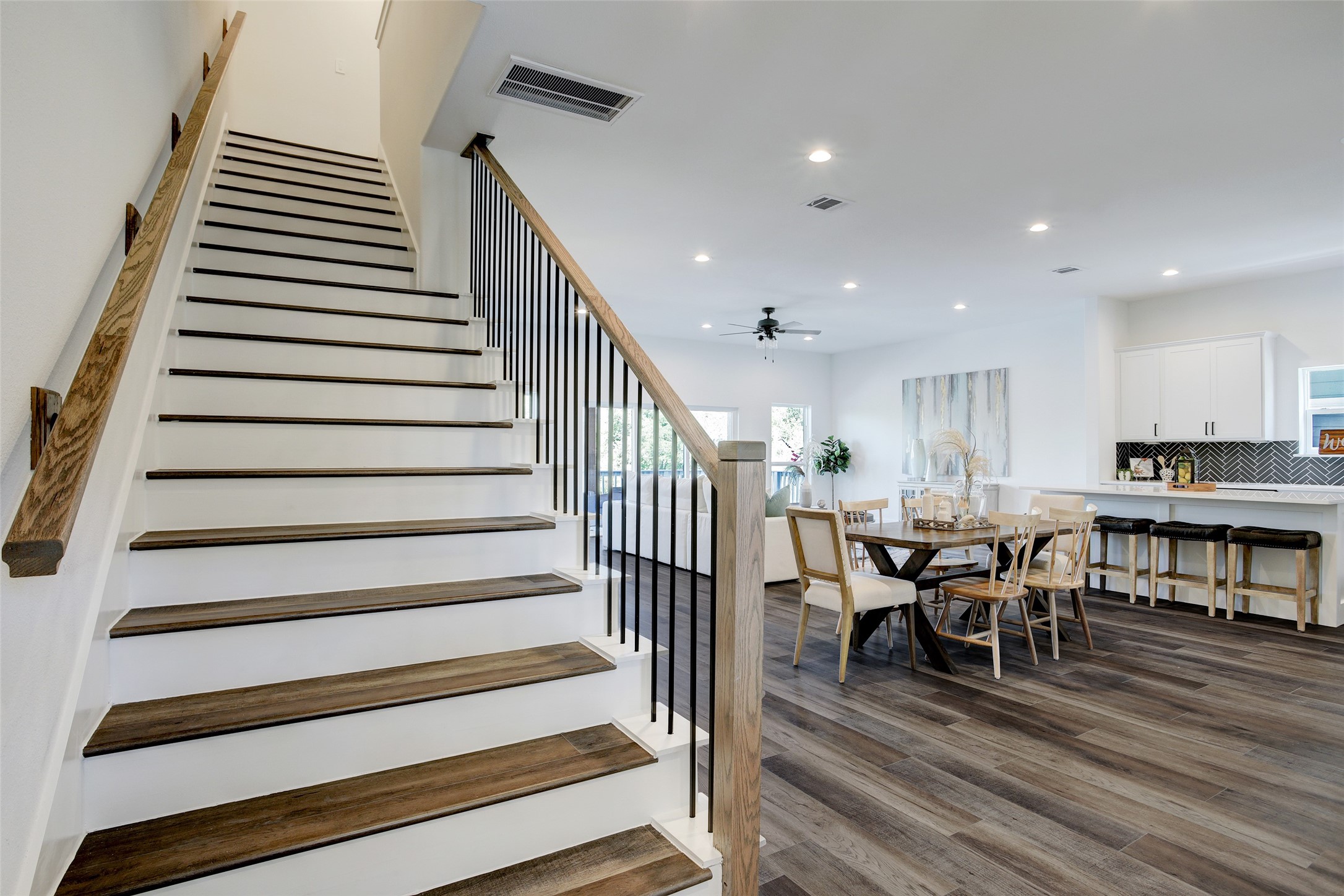 3845 Water Street Dickinson, TX 77539 - Photo 29 of 38 A grand stair case wide enough for your biggest pieces of furniture!