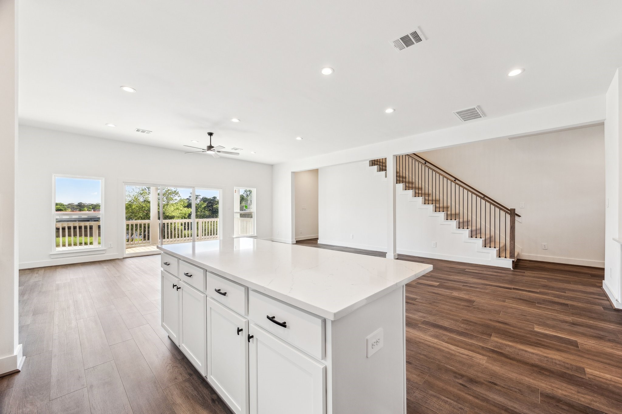 3845 Water Street Dickinson, TX 77539 - Photo 9 of 38 Shaker style cabinetry with bar seating within the kitchen.