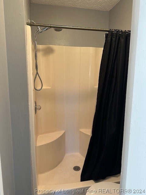 516 Jennings Farm Road Fayetteville, NC 28314 - Photo 12 of 17 a bathroom with a shower and a tub