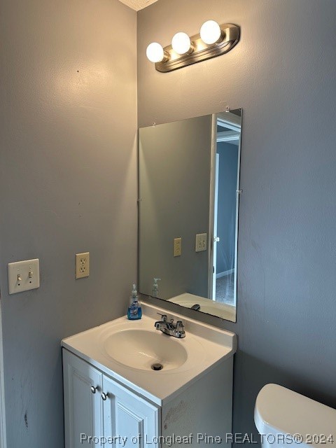 516 Jennings Farm Road Fayetteville, NC 28314 - Photo 14 of 17 a bathroom with a sink and a mirror
