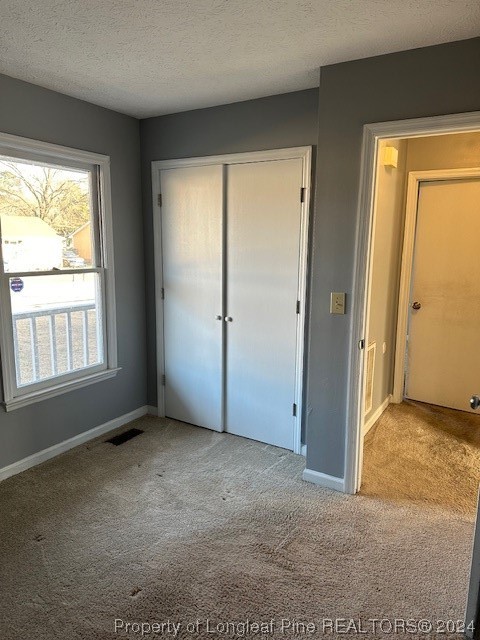 516 Jennings Farm Road Fayetteville, NC 28314 - Photo 16 of 17 an empty room with windows and closet