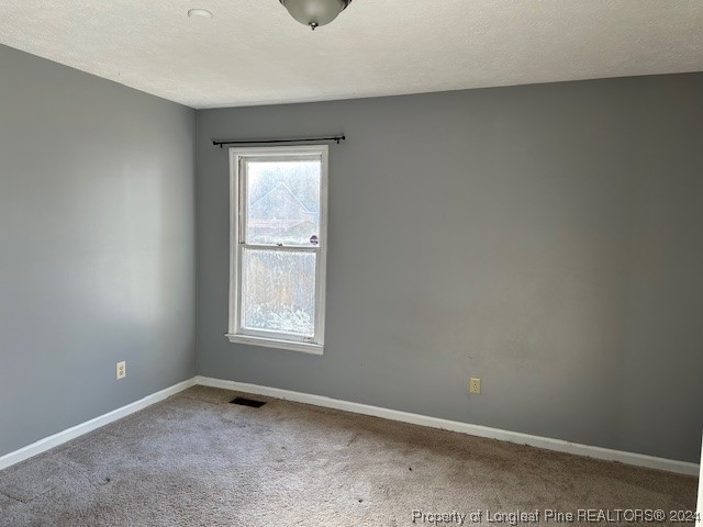 516 Jennings Farm Road Fayetteville, NC 28314 - Photo 9 of 17 an empty room with window