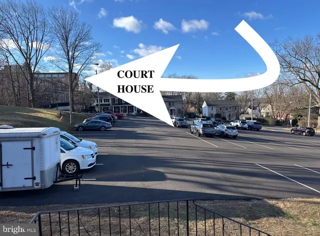 a view of a street with cars