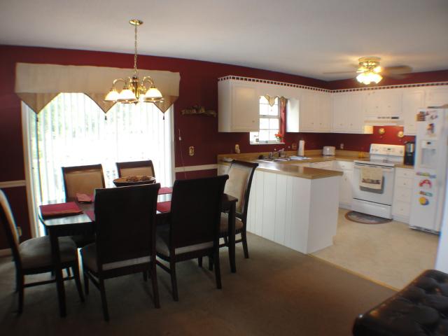 3445 New Towne Road Antioch, TN 37013 - Photo 3 of 14 a dining room with furniture a chandelier and window