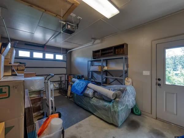 a bedroom with furniture and a gym