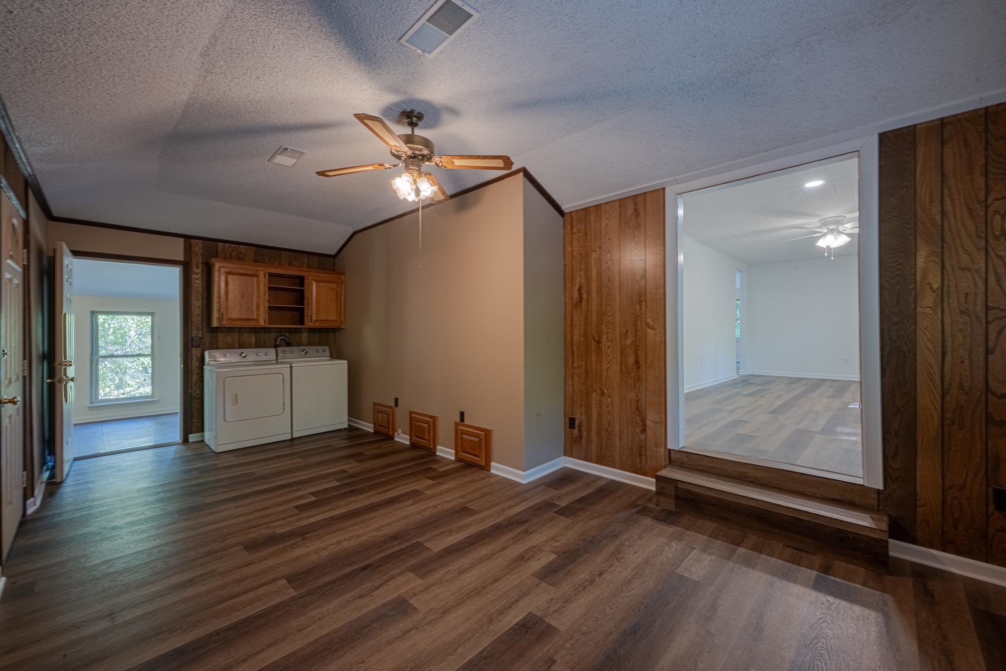 3560 Charles Bartlett Road Millington, TN 38053 - Photo 17 of 28 a view of an empty room with window and wooden floor