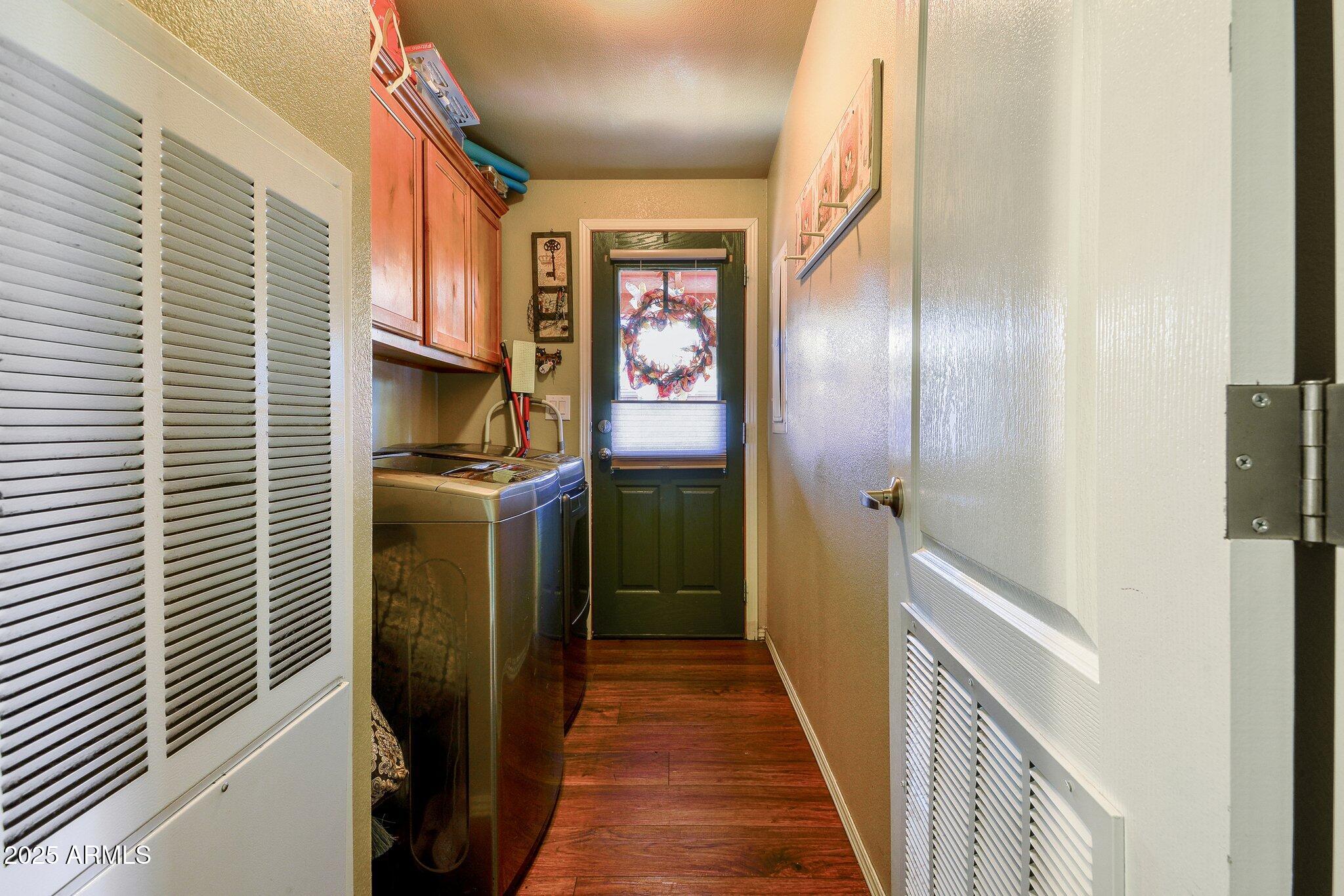 1220 Caribou Road Munds Park, AZ 86017 - Photo 26 of 42 a view of hallway with stairs