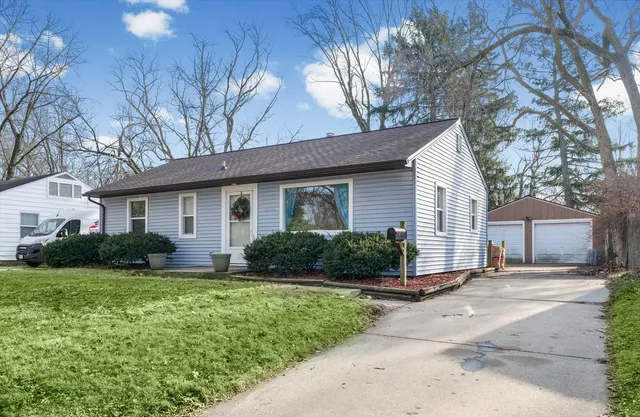 front view of a house and a yard
