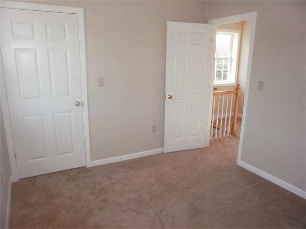 7 Beaver Path Wareham, MA 02576 - Photo 14 of 21 a view of an empty room with windows