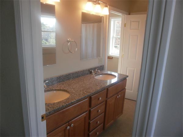 7 Beaver Path Wareham, MA 02576 - Photo 19 of 21 a bathroom with a granite countertop sink and a mirror