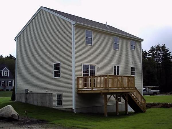 7 Beaver Path Wareham, MA 02576 - Photo 2 of 21 a front view of house with yard and outdoor seating