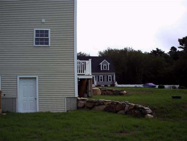 7 Beaver Path Wareham, MA 02576 - Photo 3 of 21 a view of a house with a yard and sitting area