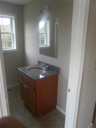 7 Beaver Path Wareham, MA 02576 - Photo 5 of 21 a utility room with washer and dryer