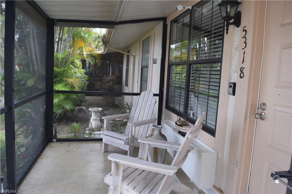 5318 Treetops Drive, Unit IG3 Naples, FL 34113 - Photo 10 of 13 a view of balcony with a potted plant