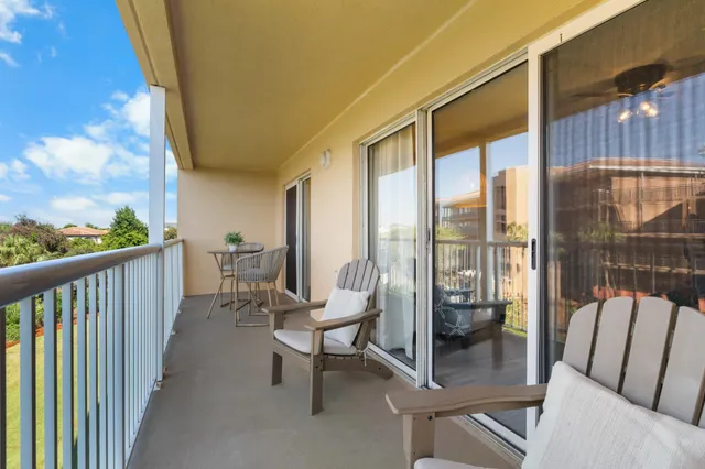 a balcony with chairs