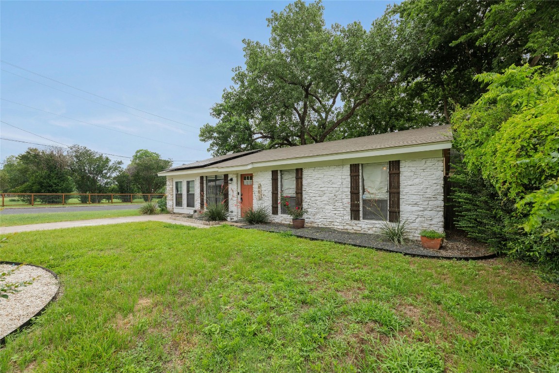 801 East 3rd Street Georgetown, TX 78626 - Photo 3 of 26 Listing photos were taken during the spring season; landscaping appearance may differ due to seasonal dormancy.