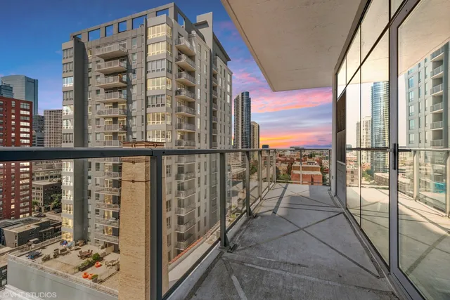 a view of a balcony with city view