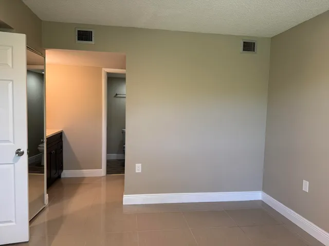 an empty room with closet