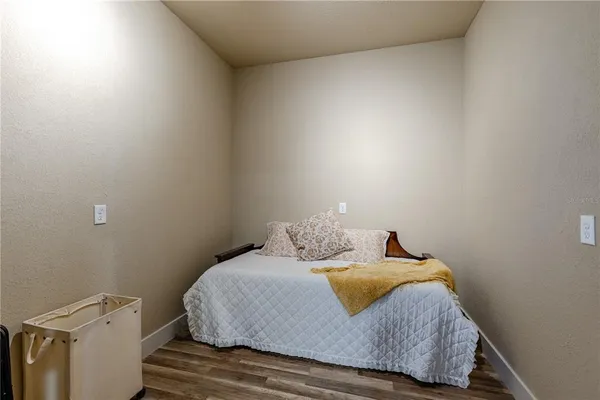 a kitchen with granite countertop a sink and a stove top oven