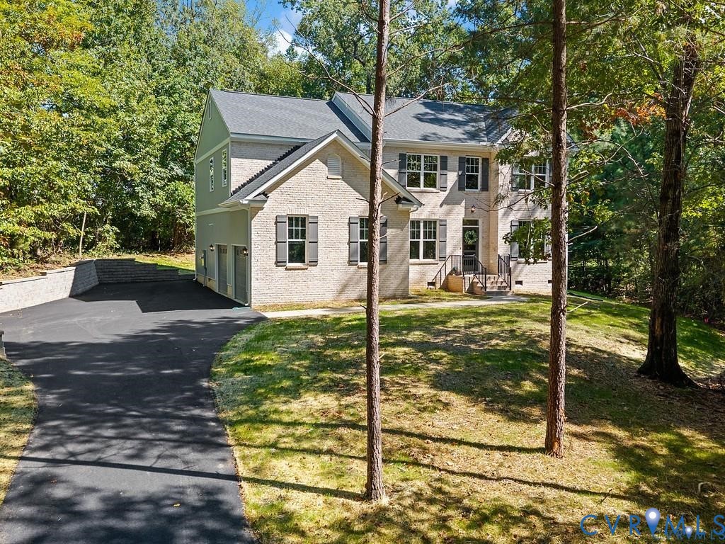 4321 Saratoga Road Richmond, VA 23235 - Photo 45 of 50 Front View of Home, Yard, Paved Driveway & THREE C